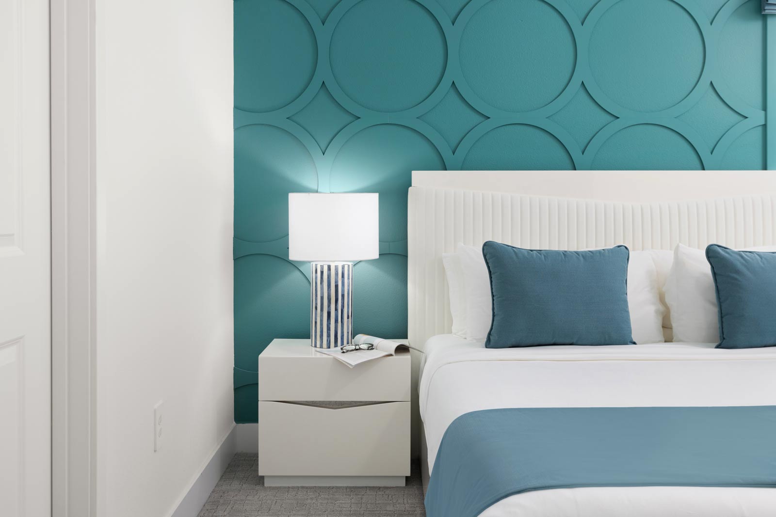 bedroom with bed and side table with lamp