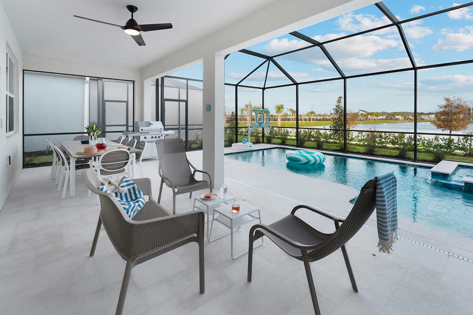 pool and patio with lounge chairs