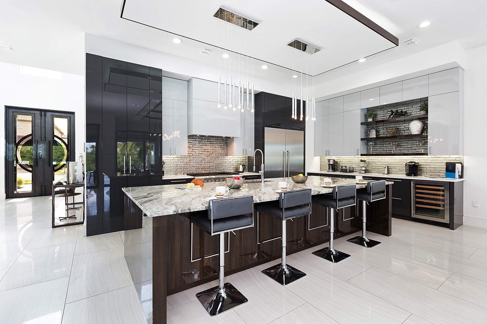 kitchen with island and 4 stools