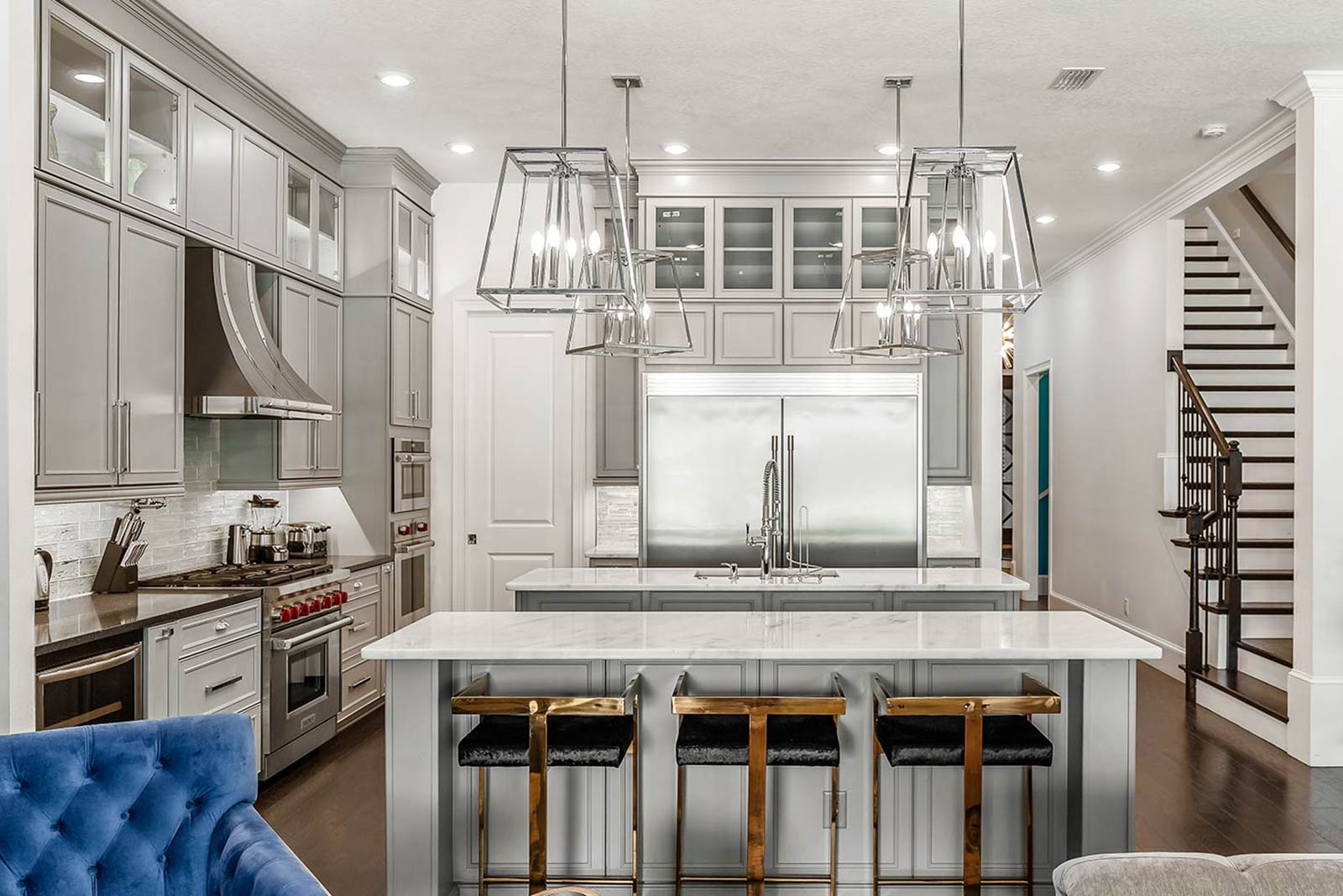 kitchen with island and 3 stools