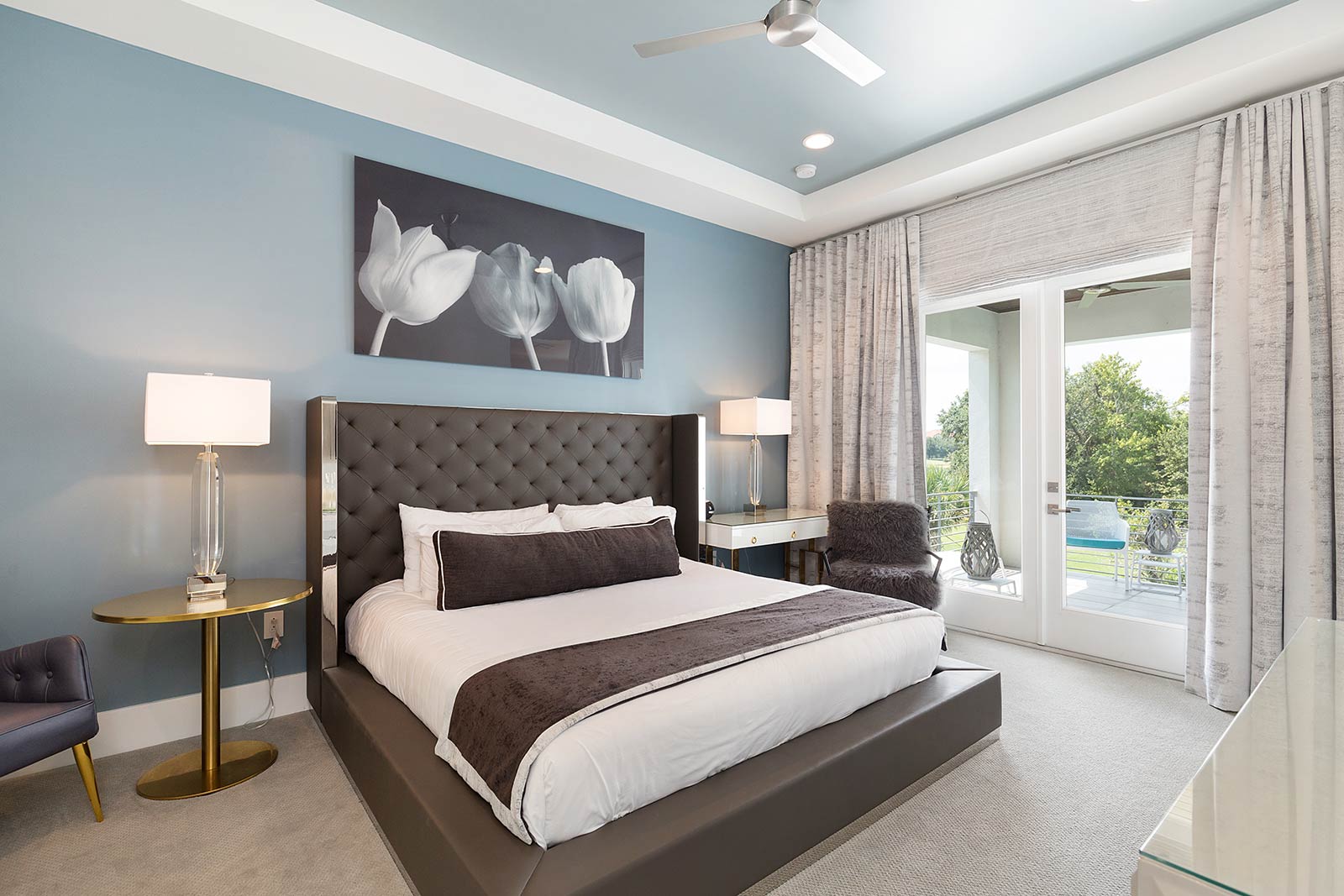 bedroom with king bed with brown frame