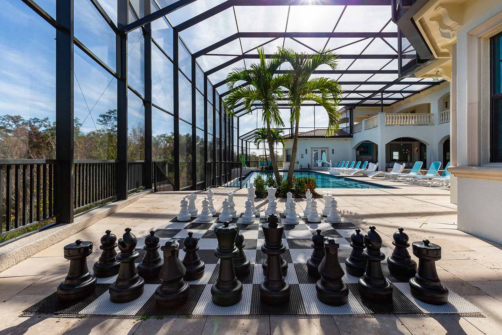giant chess board near outdoor pool