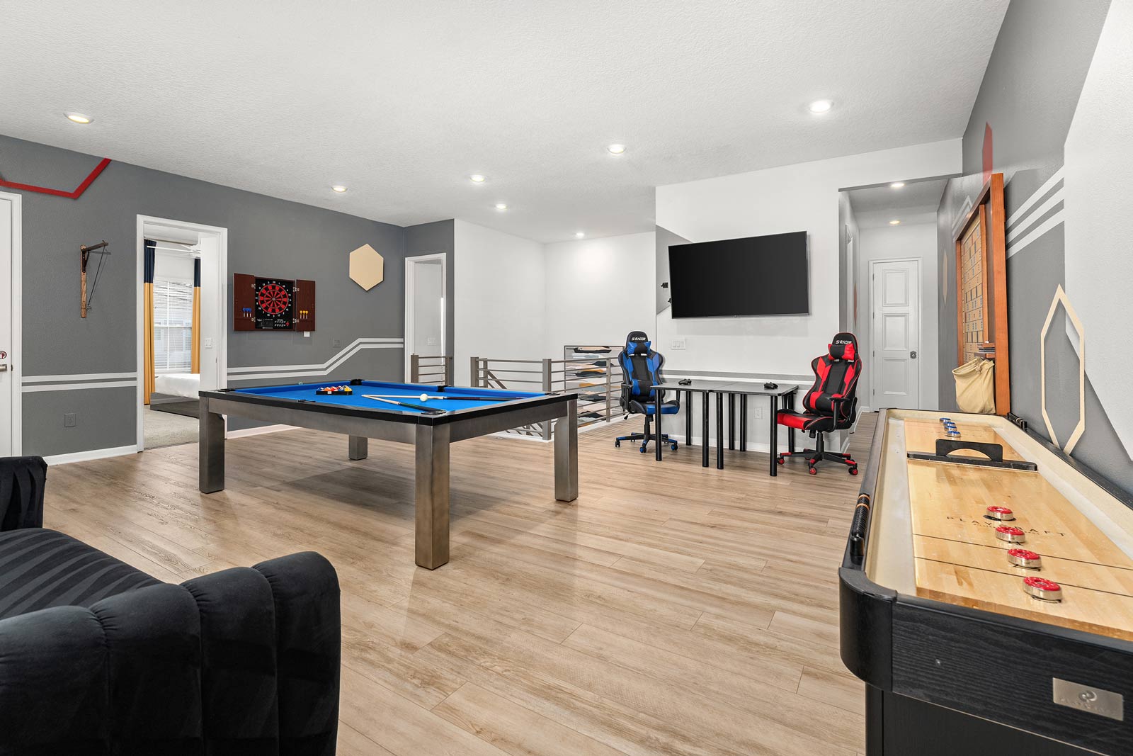 game loft with pool table and shuffleboard