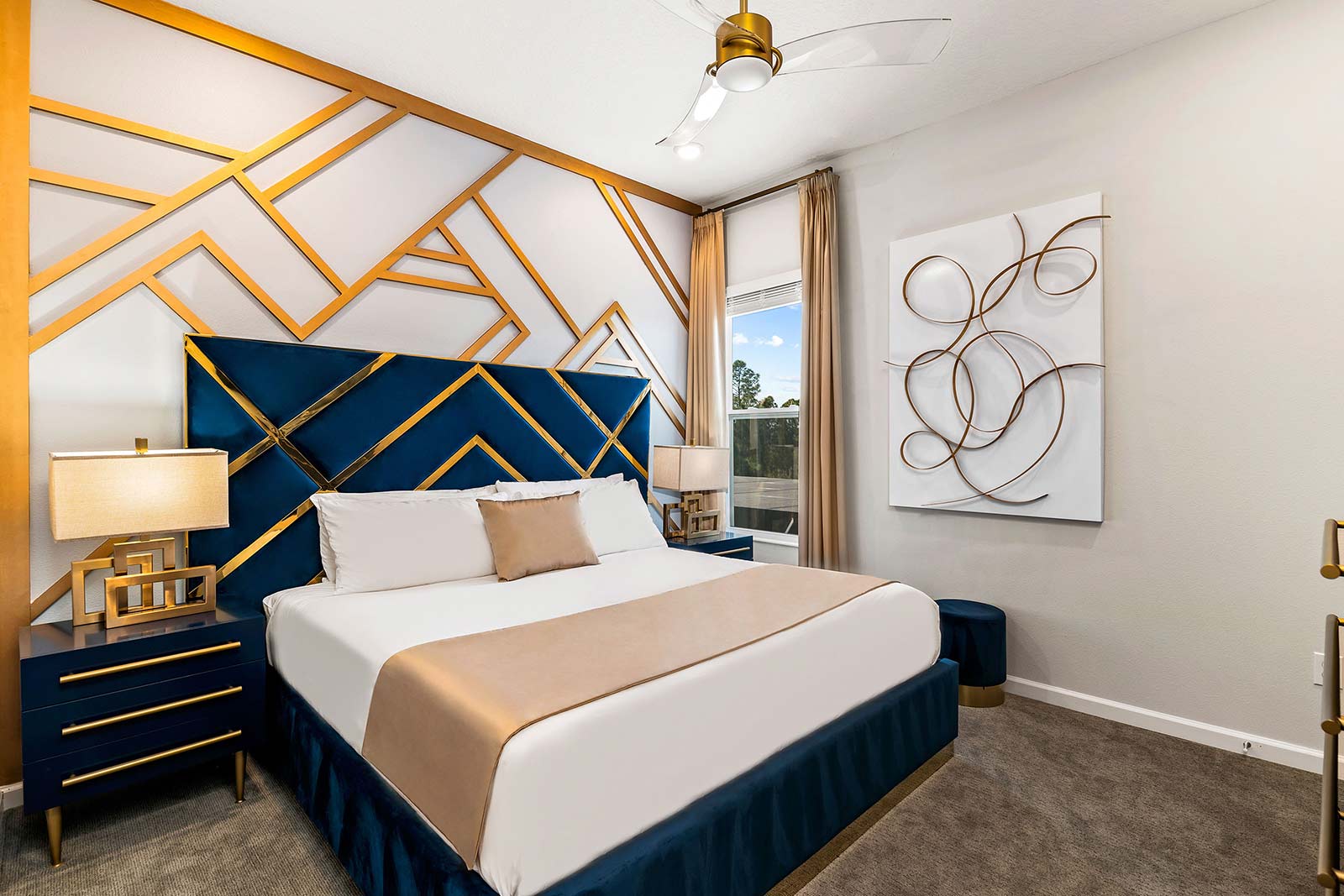 bedroom with gold and blue patterned wall