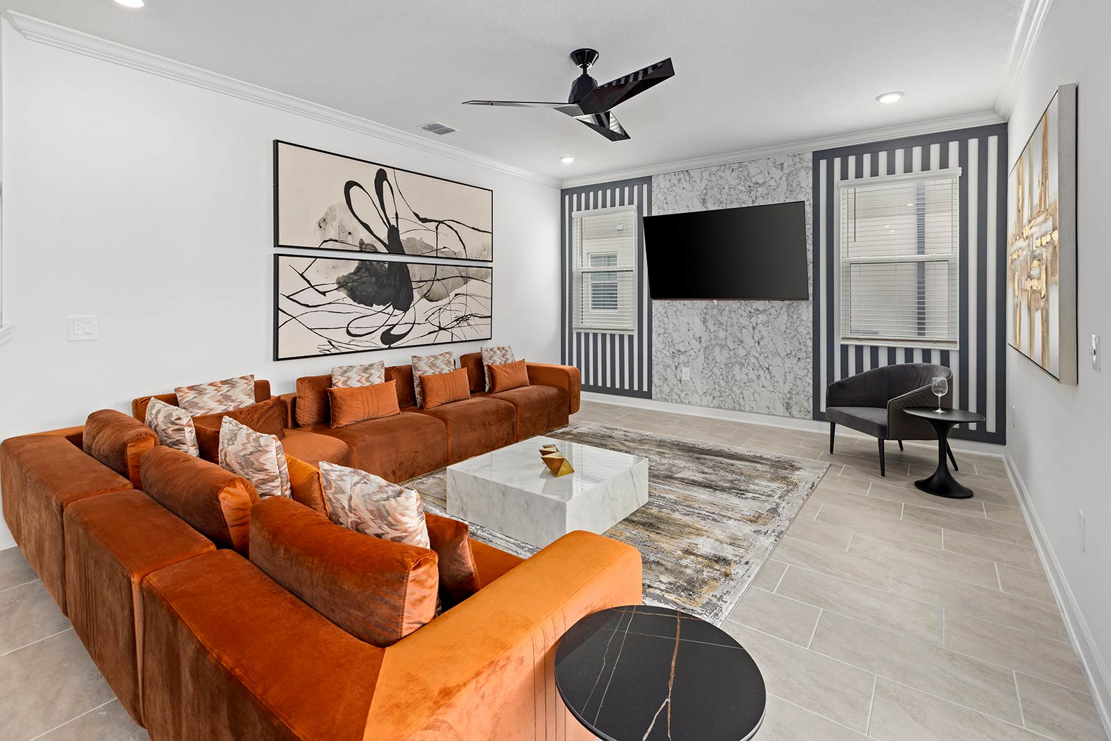 living room with l-shaped orange couch