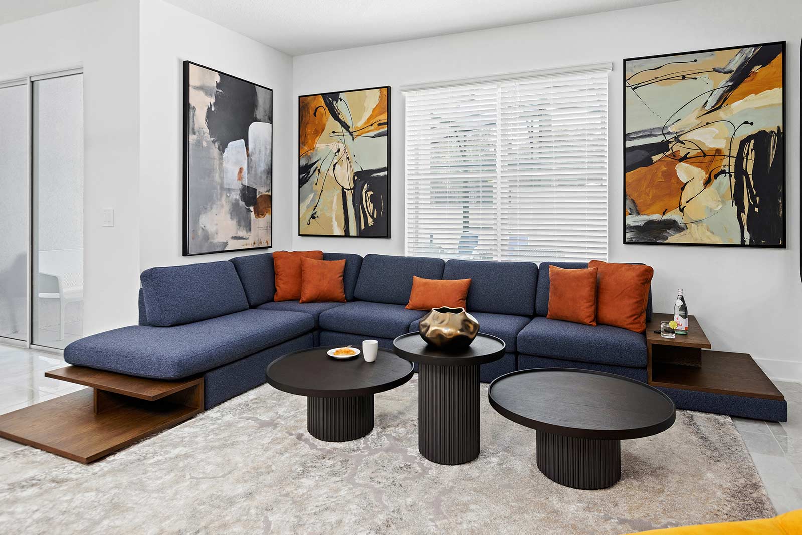 living room with blue couch