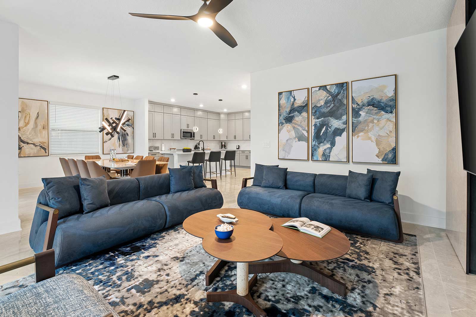 living room with two blue couches