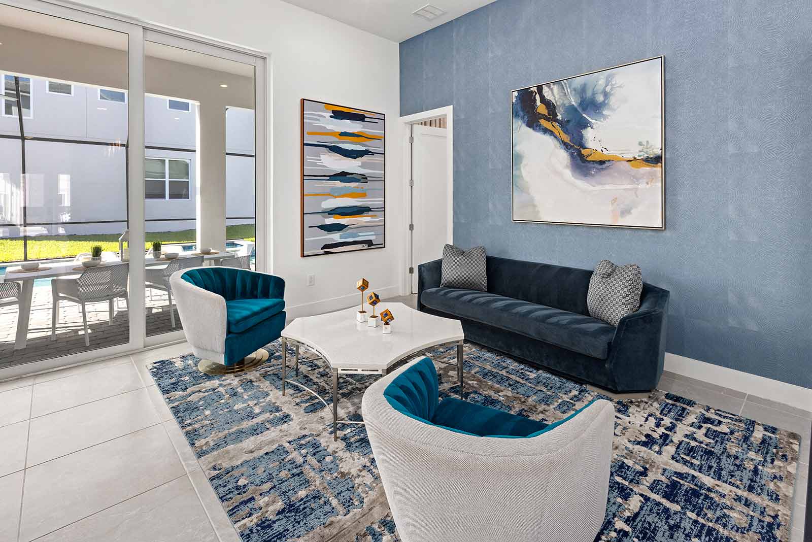 living room with couch and 2 chairs