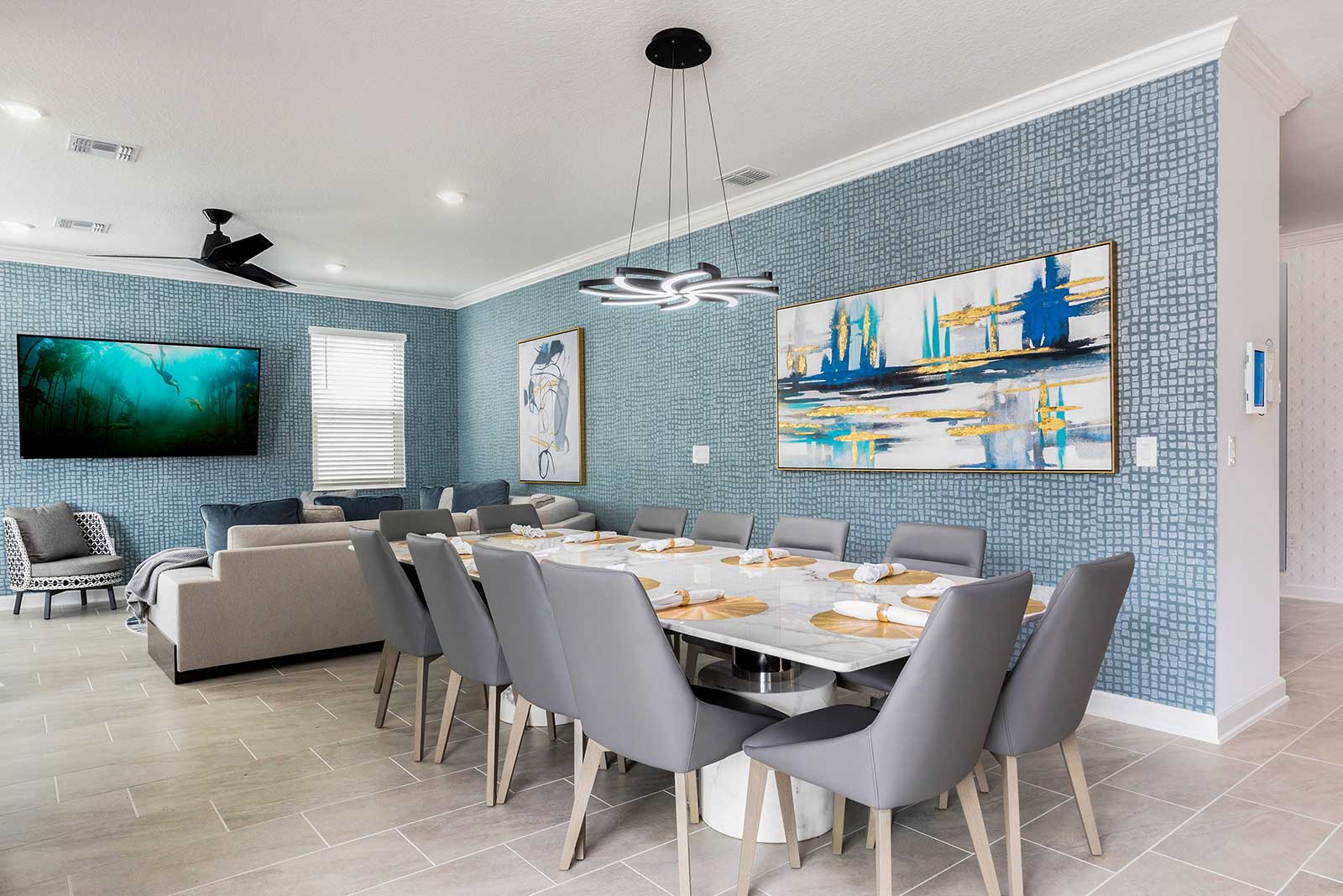 dining table for 12 next to living room couch