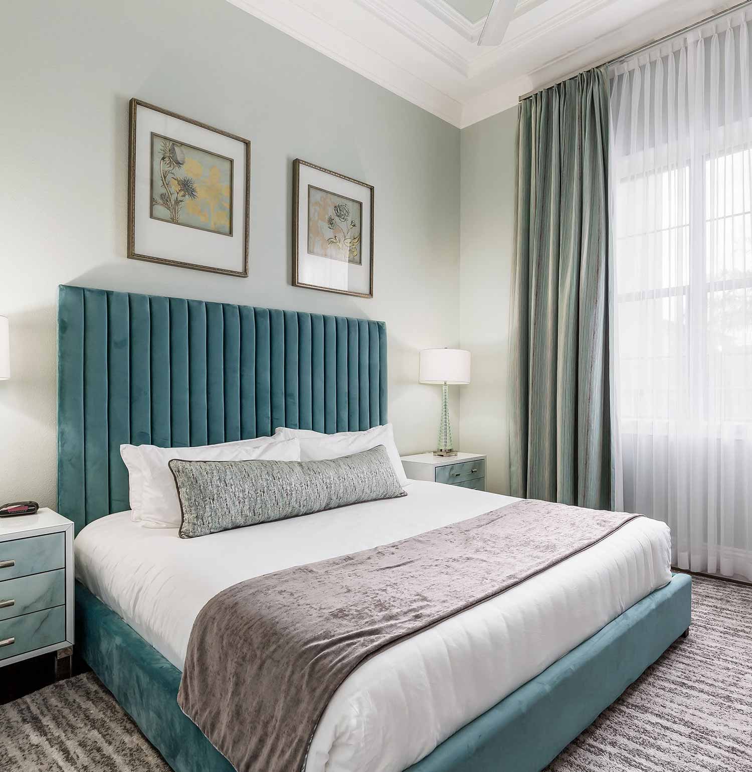 king bedroom with blue bedframe