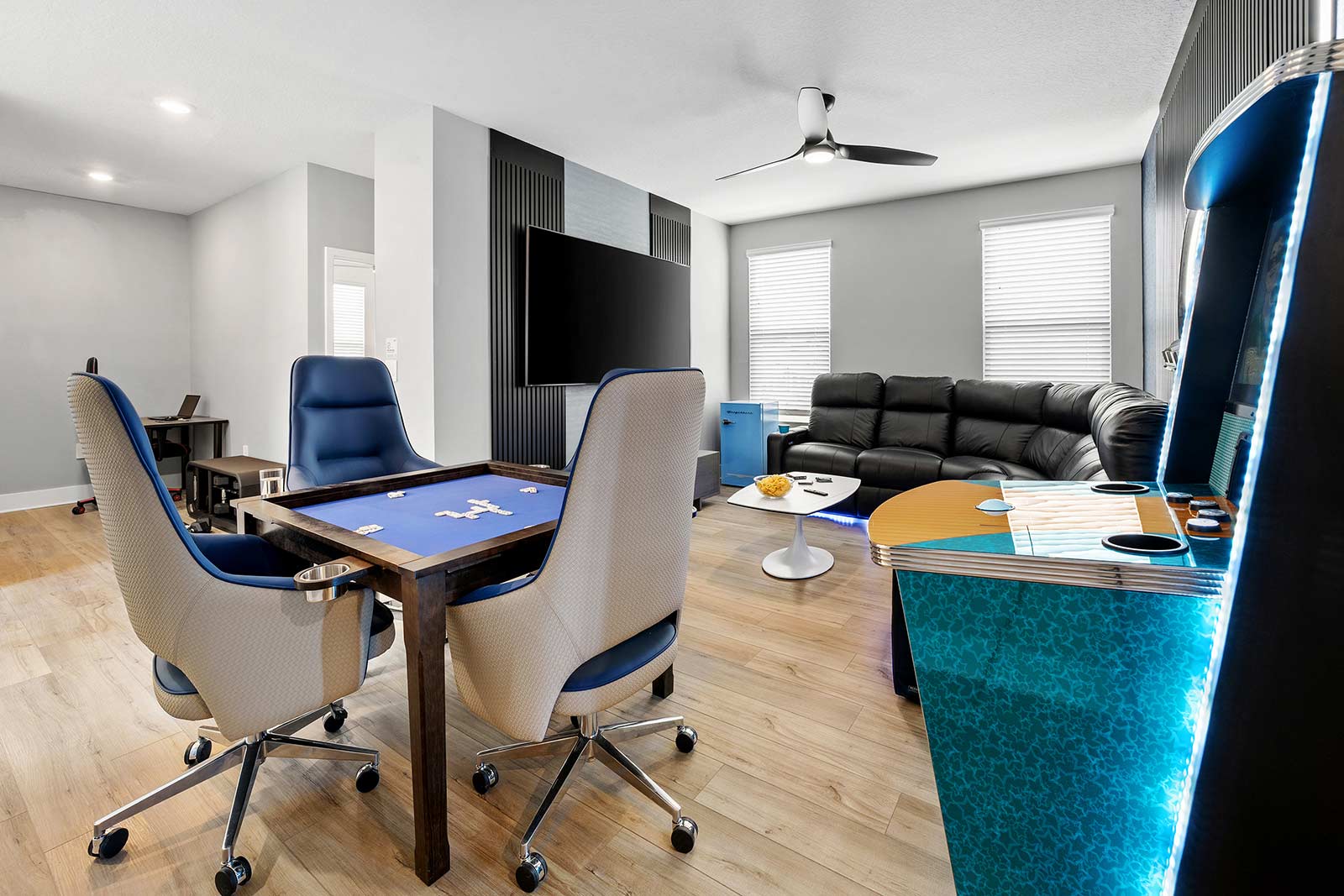 game loft with card table and arcade game