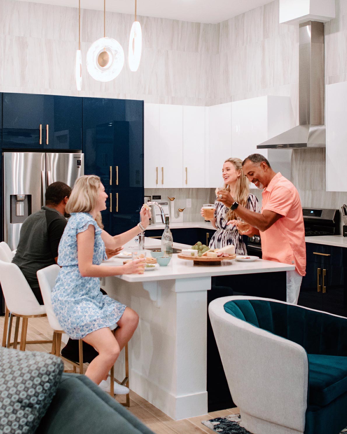 Group socializing around a kitchen island