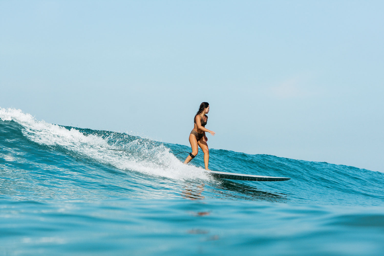 a woman surfing