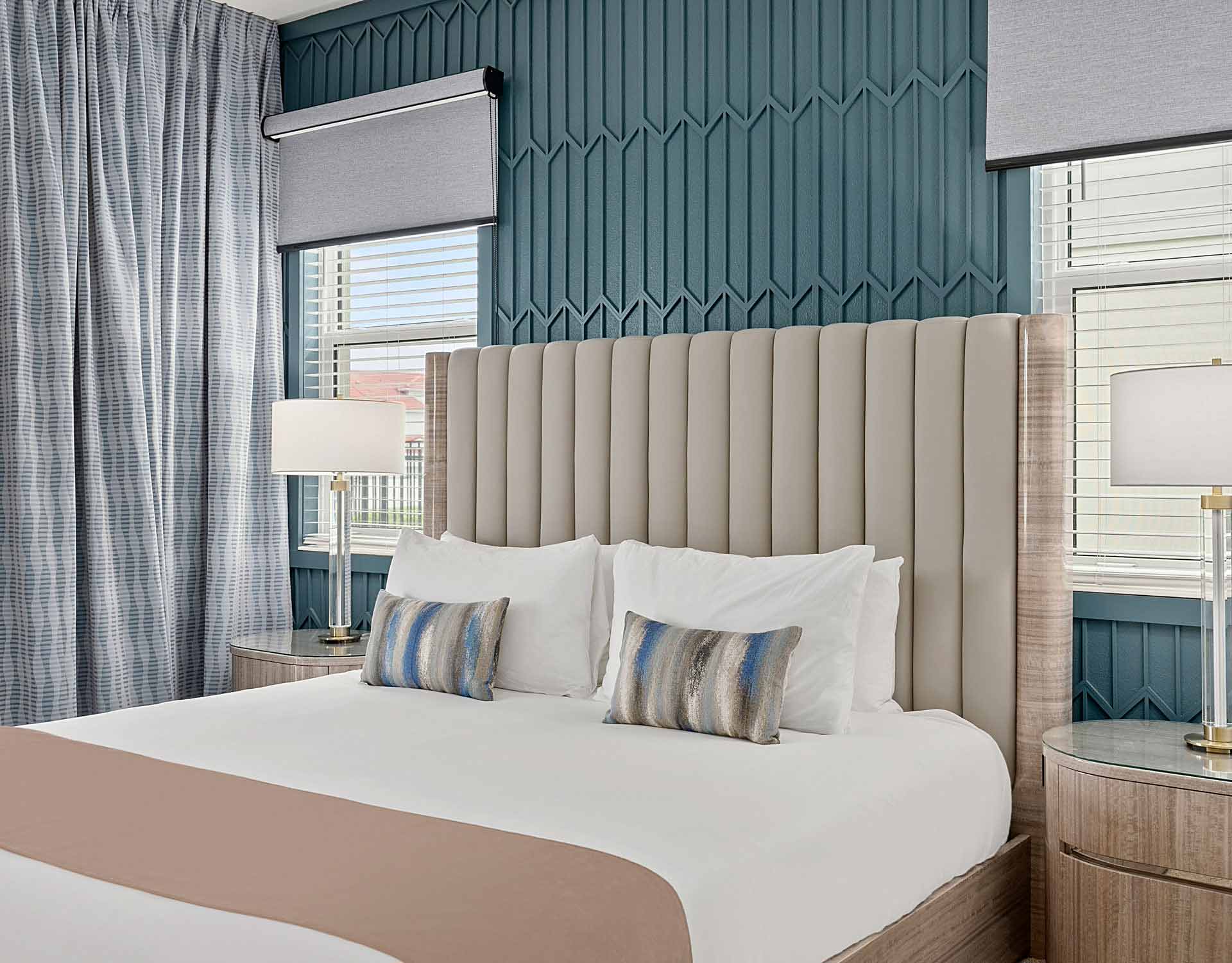 Bedroom with blue patterned wall