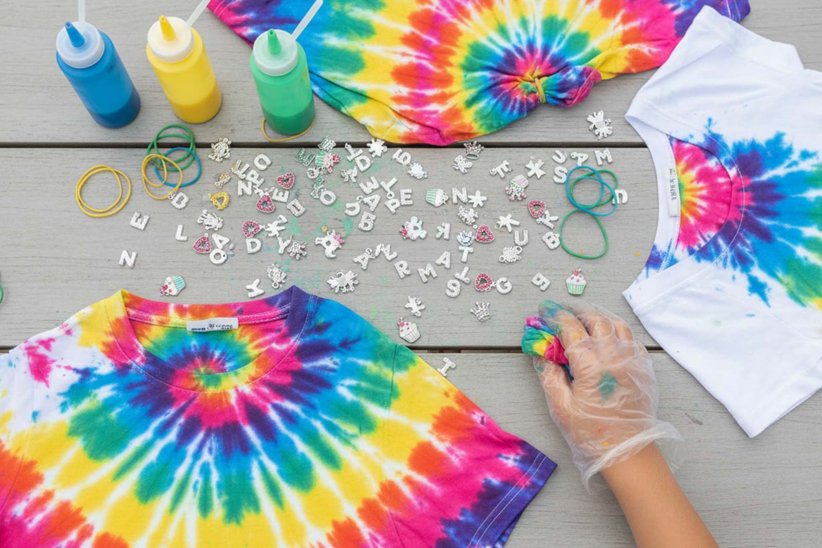 tie-dye shirts and charms