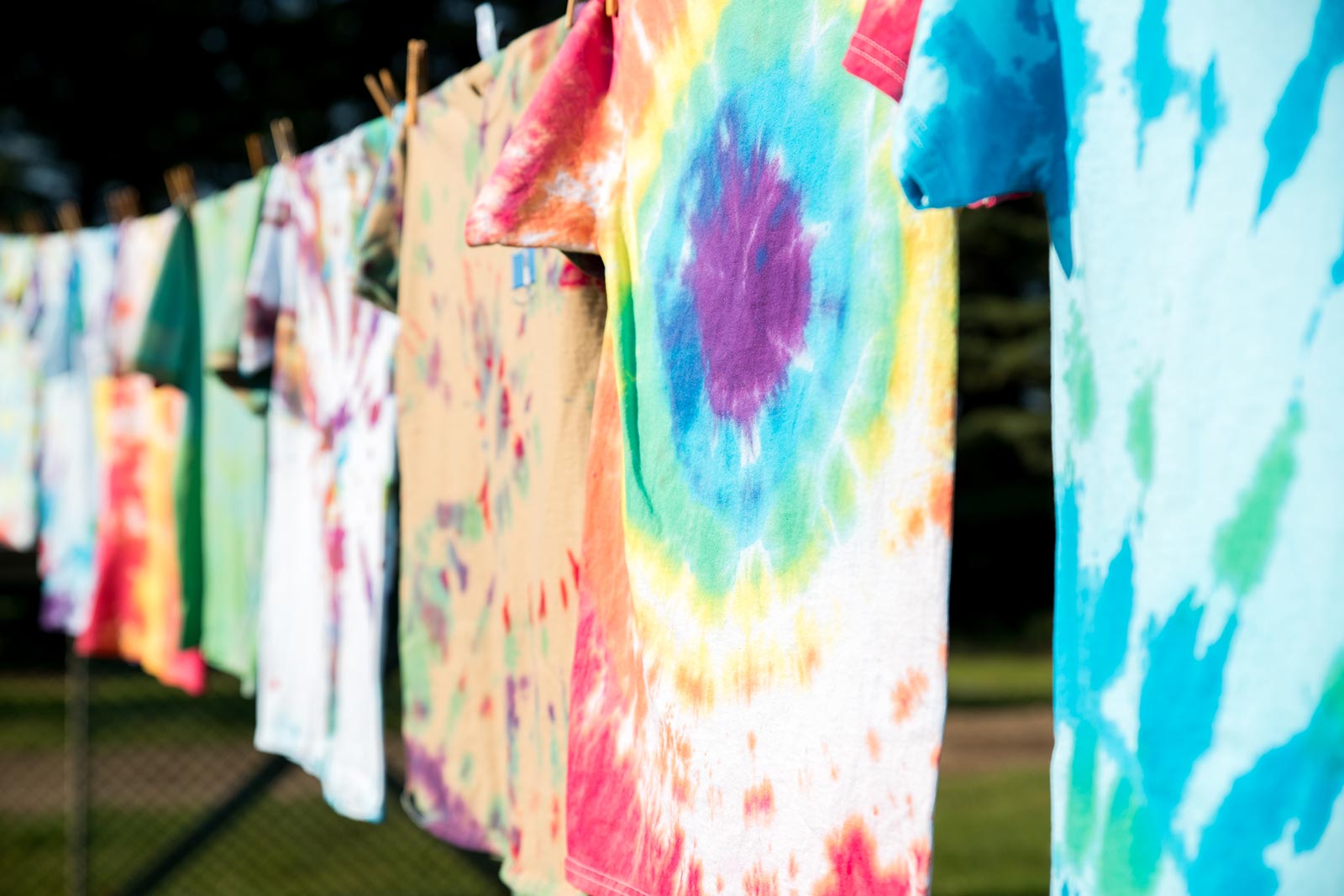 tie-dye tshirts on a clothing line
